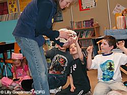 Wildlife education volunteer Sandy Dickinson teaches bear safety and natural history to third graders at Snowshoe Elementary School Dickinson visited more than 45 classrooms in Palmer and Wasilla in the past school year to raise bear awareness