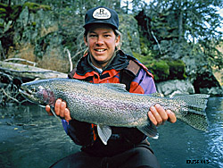Brad Bentner holds a nice rainbow A few supplies and a little care mean a nice trout like this can become a treasured keepsake Mounts can also be prepared for fish that are released alive Photo courtesy USFWS