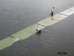 Fish Techs installing white panels underwater to make the salmon viewing easier ADFampG photo