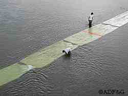 The panels are necessary for counting fish because even though the returning salmon are bright red they are amazingly difficult to see against the dark river bottom