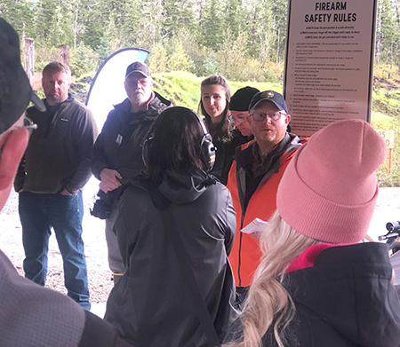 Ryan Scott speaks at the reopening of the Hank Harmon Range