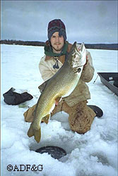 Corey Schwanke of Glennallen holds a big Alaska lake trout