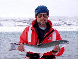 A Dolly Varden captured for a fishery research project