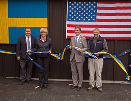 Larry Van Daele far right at the ribbontying ceremony opening the Taquka exhibit at Orsa Groumlnklitt Bear Park in Sweden Photo courtesy Anders Bjoumlrklund