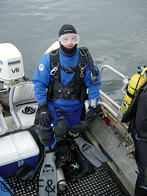 The author in diving gear ready for work