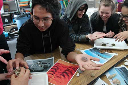 Students learning about estuary animals