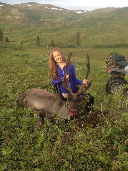 In many parts of Alaska away from homes and camps carcass disposal is not an issue Sarina Mancari 15 and her first caribou harvested in Unit 13 Steve Voth photo