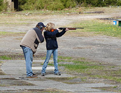 Hunter Education instructor Kirk Lingofelt coaches a student learning to use a shotgun Photo by Boyd PorterADFampG