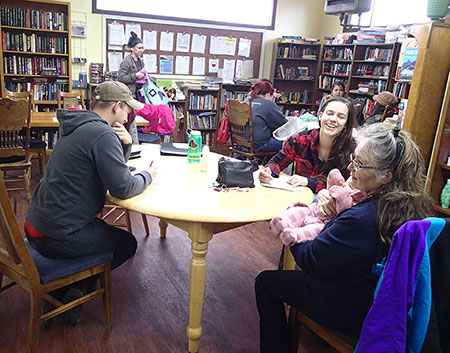 Division of Subsistence researchers conduct community surveys with residents in Yakutat Photo by Lauren Sill