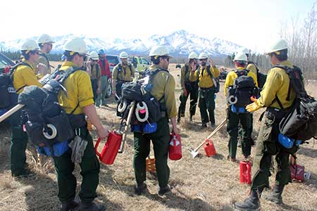 The White Mountain crew briefing The participation of the crew vastly improved the scope of the burn Photo by Tim Mowry