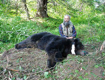 LaVern Beier and Bear 425 a very dark colored brown bear collared in the Berners Bay area in June of 2007 Very dark and even blackcolored brown bears are not unusual on Admiralty Island