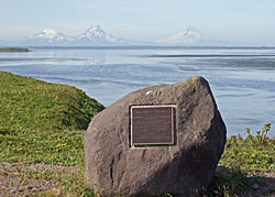 Volcanoes appear on the horizon from Grants Point look out
